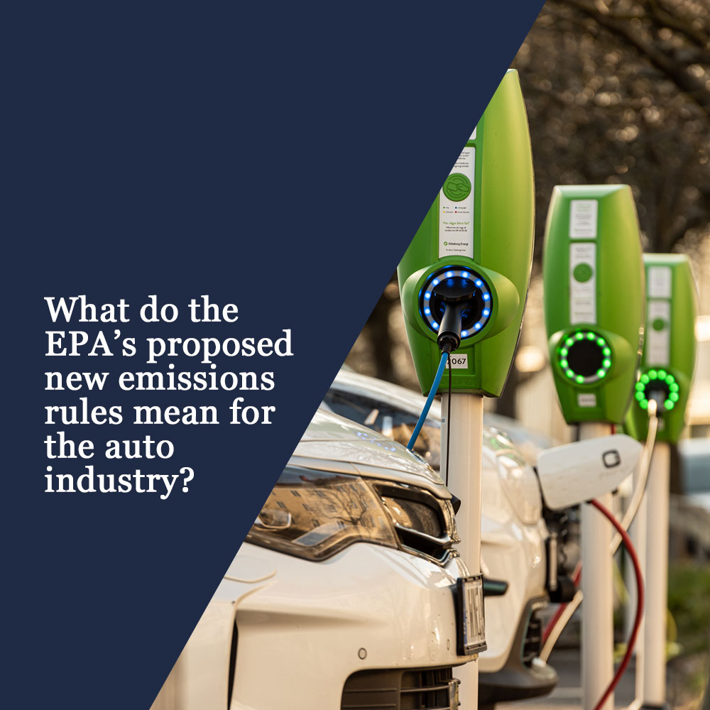 What do the EPA's new emissions rules mean for the auto industry? Graphic includes text about proposed new emissions standards alongside a row of hybrid and electric vehicles at EV chargers